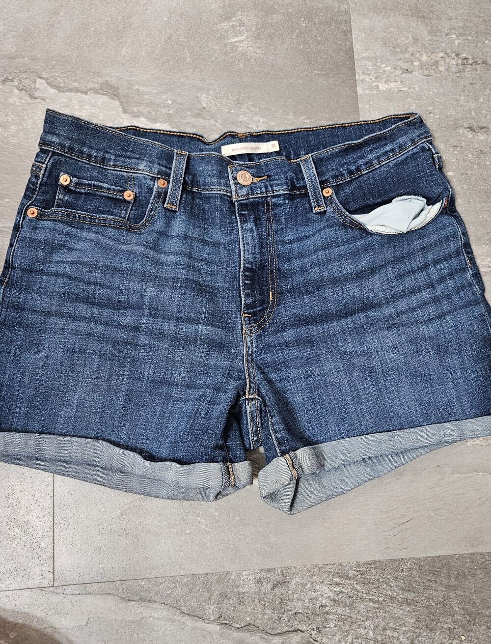 Levi's Red Tab Cuffed Denim Mini Shorts. Blue, Dewashed. 4" Inseam. Size 31.